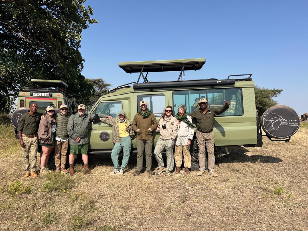Mawe African Ventures guests with safari vehicle